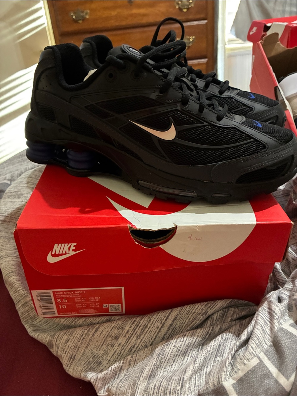 Nike Men’s Black Athletic Running Shoes with Subtle Purple Accents